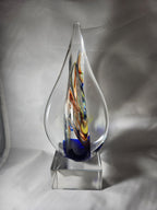 Glass teardrop award with colorful swirls on clear acrylic base, ideal for recognition