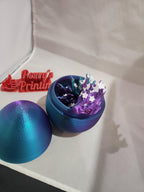 Colorful 3D printed sphere with floral interior, open on display for custom printing