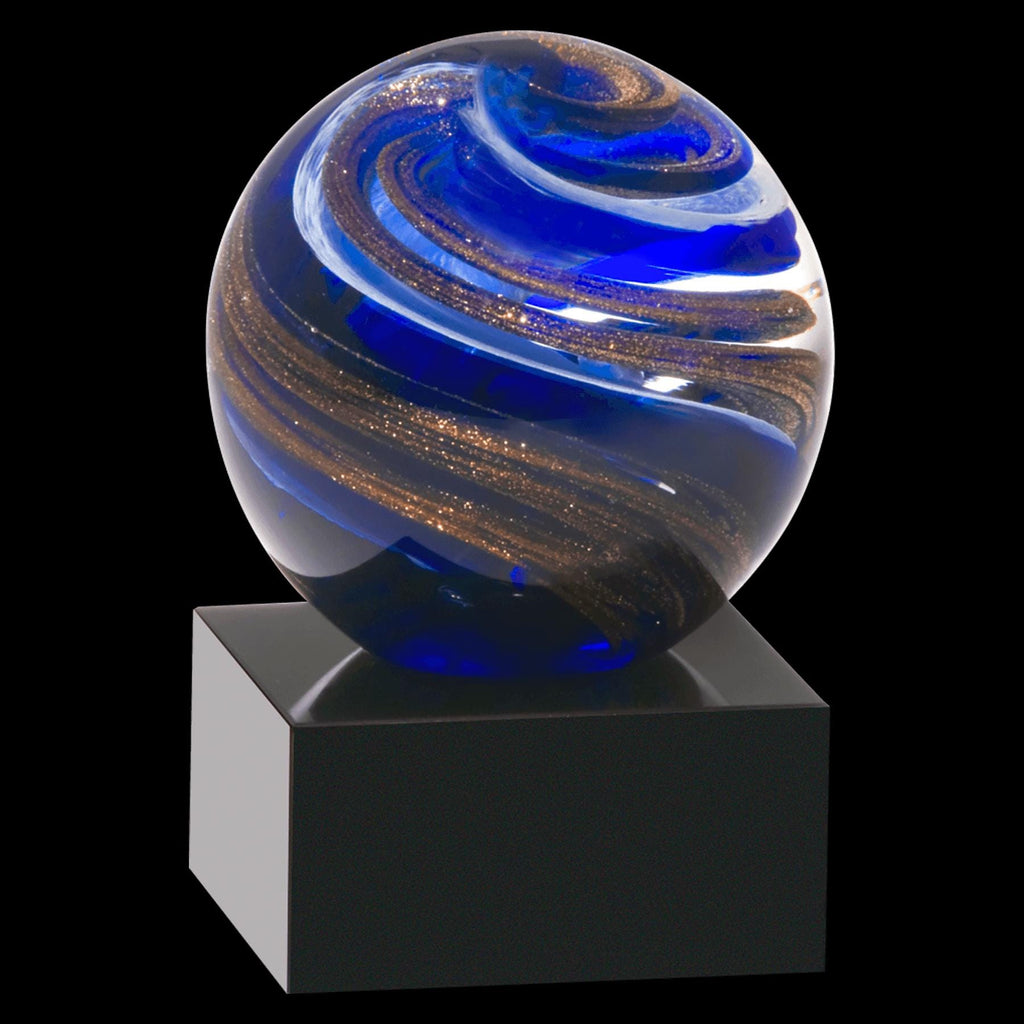Blue and gold glass swirl award on a black display base, custom recognition trophy