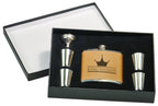 Custom engraved flask gift set with leather wrap, shot glasses, and funnel in gift box