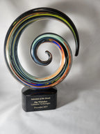 Colorful spiral glass award trophy with engraved plaque for salesman of the month