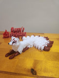 3D printed white and red nine-tailed fox figurine on wooden surface, custom design
