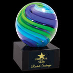 Glass award with blue and green swirl design, Employee of the Year engraved on black base