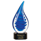 Blue and white glass award with 'Salesperson of the Year' text on a black base