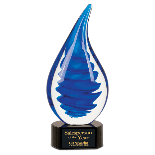 Blue and white glass award with 'Salesperson of the Year' text on a black base