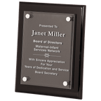 Plaque with engraved text on a black frame