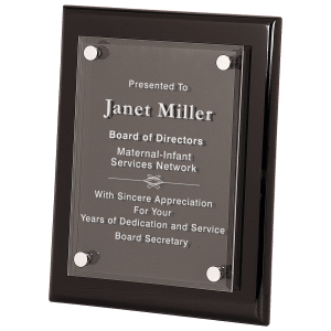 Plaque with engraved text on a black frame