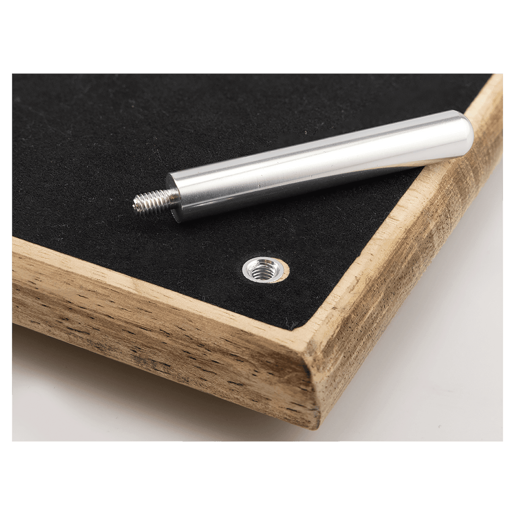 Metal rod with threaded end on a wooden surface