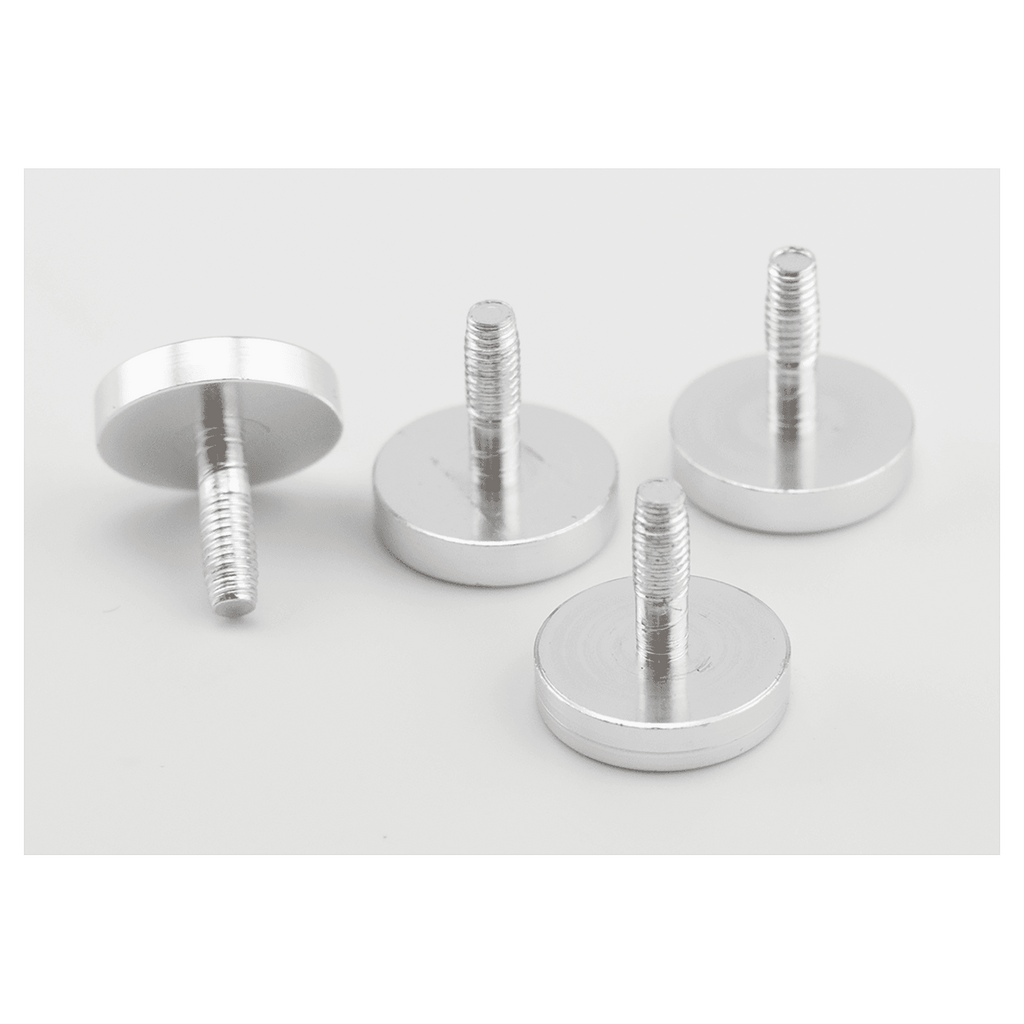 Set of metallic screws on a light gray background