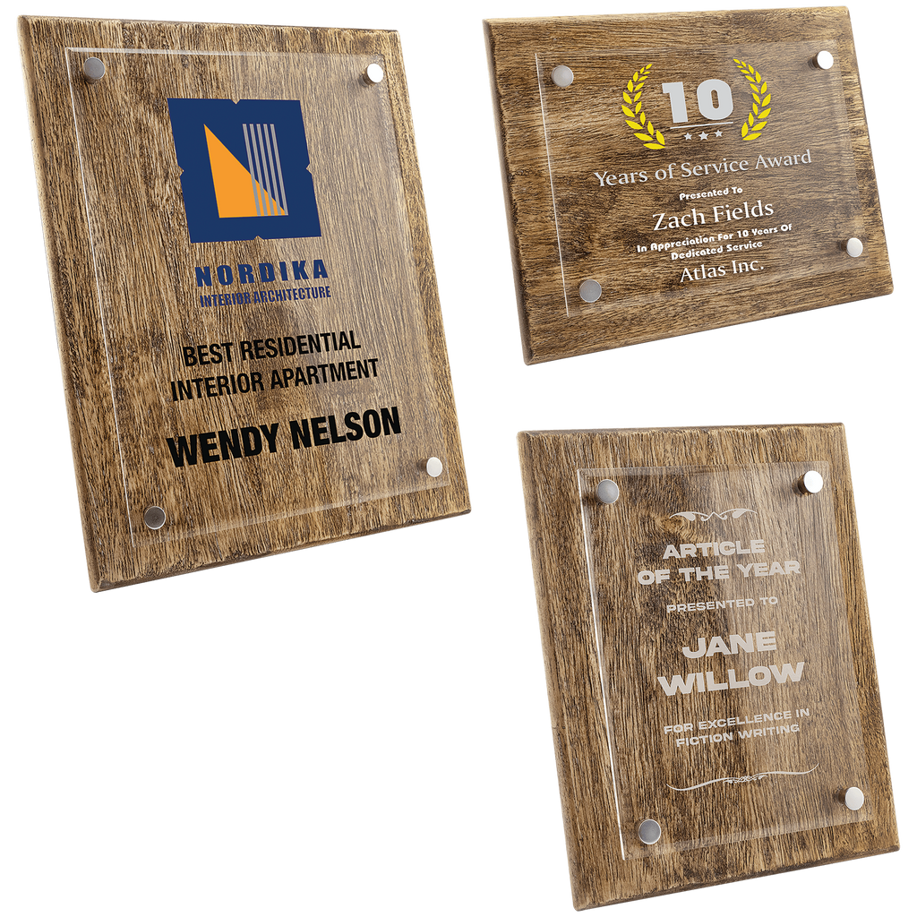 Three wooden plaque awards with engraved text on a white background