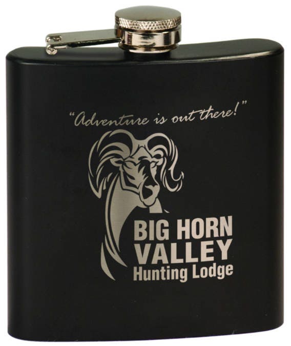 Black engraved stainless steel flask with ram graphic and 'Big Horn Valley Hunting Lodge' text.
