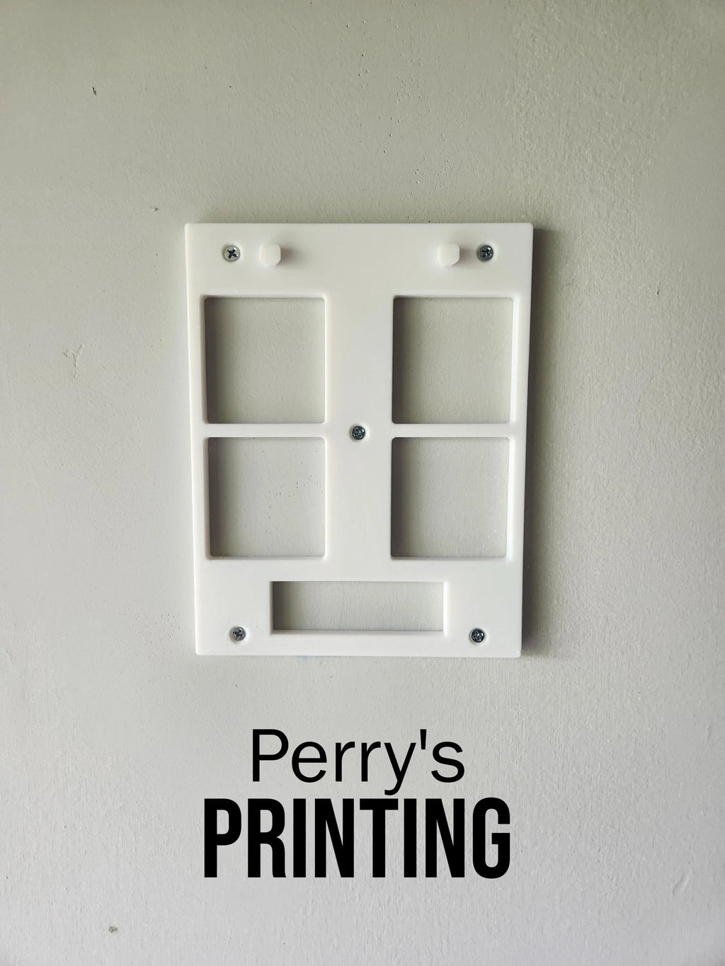 White 3D printed mounting bracket on wall, Perry's Printing text below, minimalist design