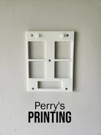 White 3D printed mounting bracket on wall, Perry's Printing text below, minimalist design
