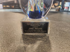 Engraved crystal award with blue accent honoring Janet Baxter for stageplay direction