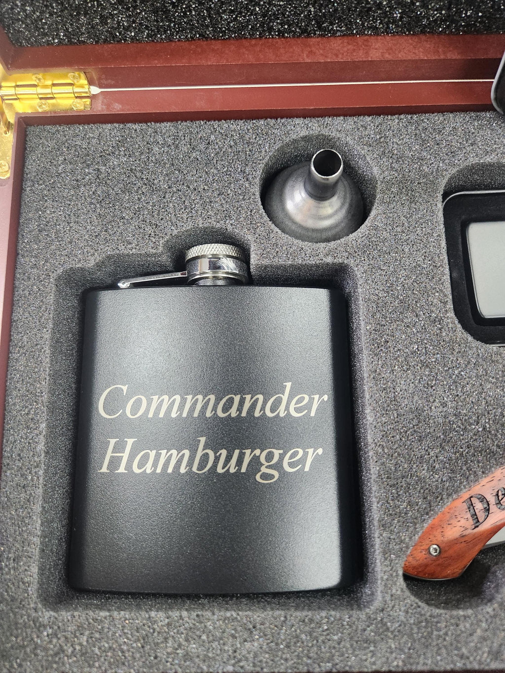 Custom engraved black flask with Commander Hamburger text in a foam gift box set