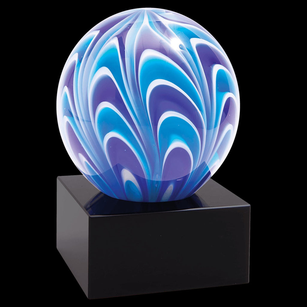 Blue and purple glass art award sphere with abstract pattern on black base