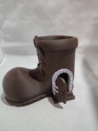 3D printed brown boot planter with miniature arched door, whimsical home decor