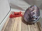 3D printed Perry's Printing sign and geometric object on wood surface, custom printing display