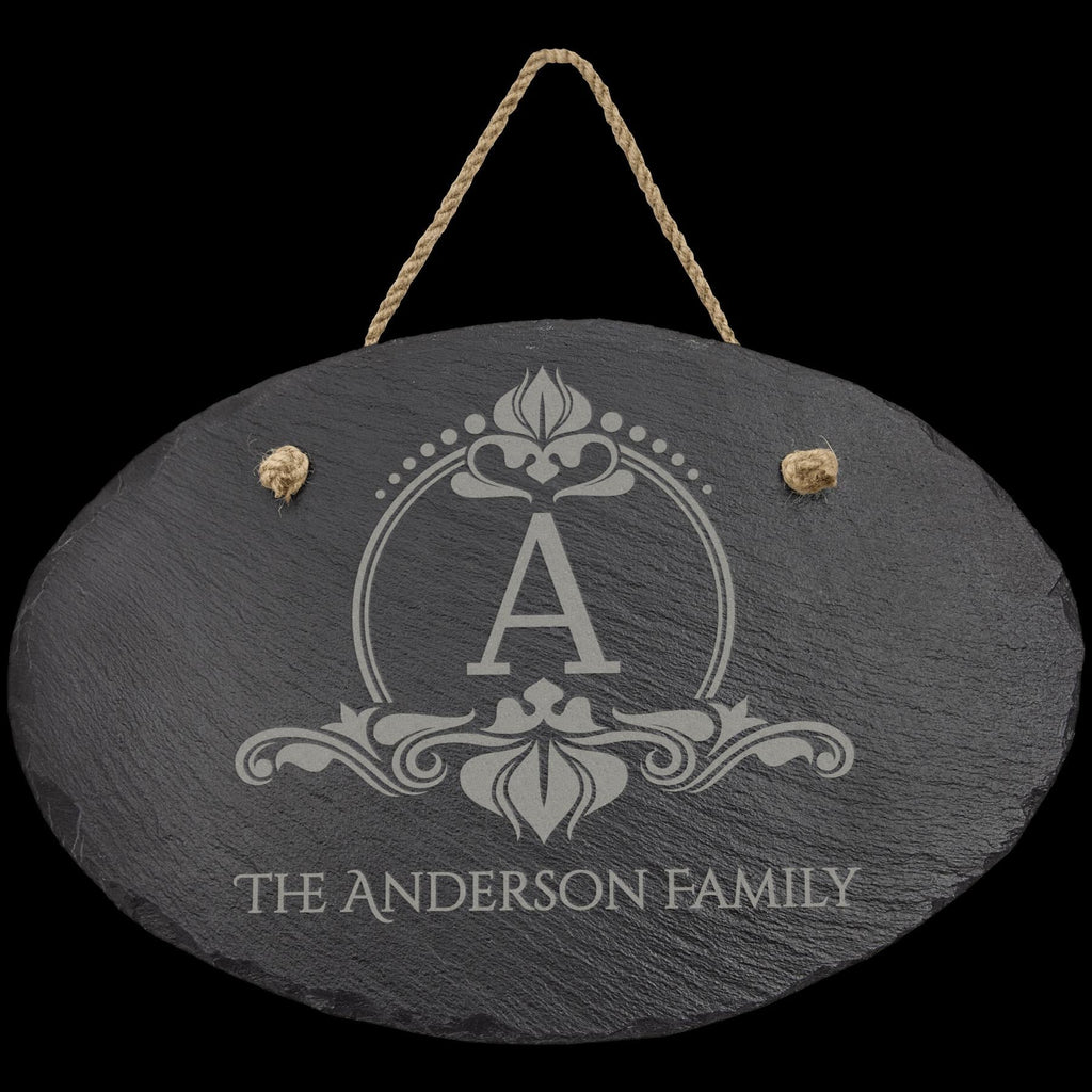 Custom engraved slate sign with letter A and The Anderson Family, hanging from rope.